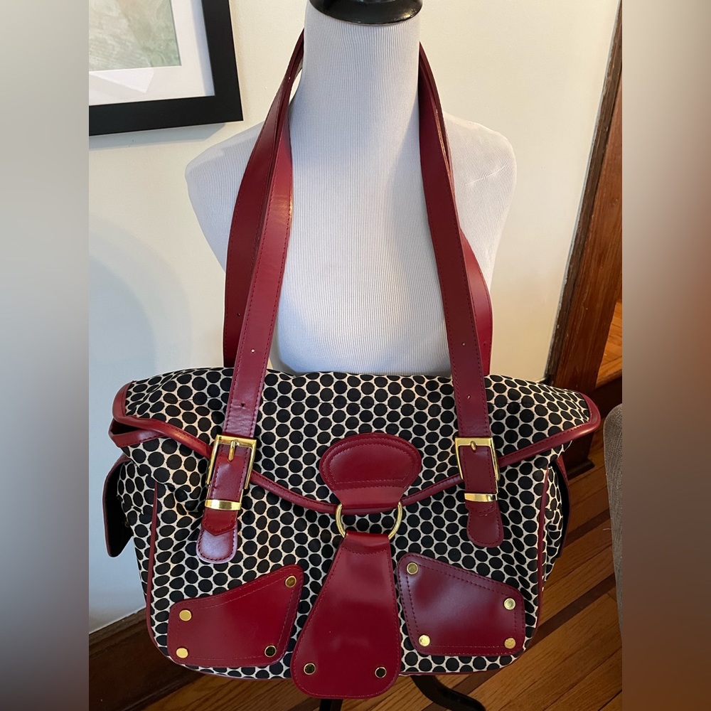 Mia Bossi diaper bag. Gorgeous. Roomy with multiple pockets. Rich deep red trim